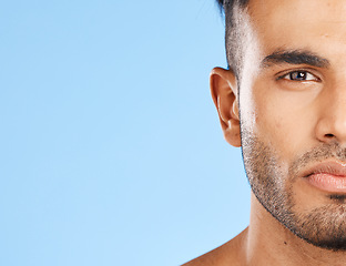 Image showing Health, skincare and portrait of man blue background with mockup, advertising space or product placement. Luxury male body care, clean face closeup and healthy lifestyle mindset in studio background.
