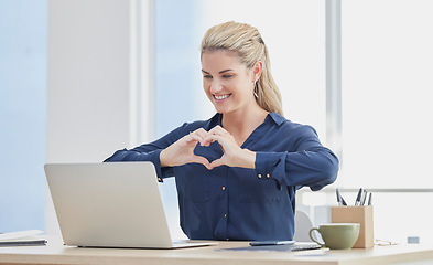 Image showing Laptop, hand heart and business woman in an office, smile and happy while on video call with investor for startup. Hands, love and woman entrepreneur showing thank you sign in a video conference