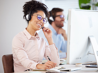 Image showing Call center, black woman and customer service on computer, consulting agency and contact us, help and telemarketing company at office desk. Happy consultant, sales worker and business communication