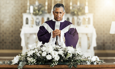 Image showing Funeral, prayer and pastor in a church for worship, farewell and praying over a coffin. Pray, death and church service by a priest talking, offering comfort and spiritual guidance at funeral service