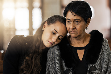 Image showing Sad, empathy and funeral with women in church for mourning, grief and death. Loss, respect and console with mother and daughter at chapel for burial ceremony for depression, remember and sorrow