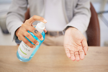 Image showing Hand sanitizer, safety and spray business woman at desk for bacteria, covid or healthcare. Cleaning, disinfection and employee hands and antibacterial soap for hygiene, virus or pandemic prevention