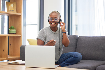 Image showing Laptop, call center and black woman with a work from home job doing an online consultation in her home. Customer support, video call and telemarketing agent doing a ecommerce sale with a crm strategy