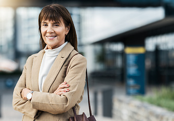 Image showing Senior portrait of confident business woman with smile, crossed arms and happy with career growth, job or success. Pride, women empowerment and experienced worker satisfied with building development