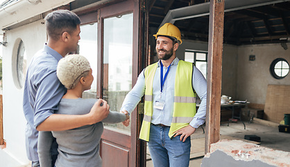 Image showing Couple, home rennovation and construction builder shaking hands for congratulations on new house, real estate purchase and handyman. Industrial architect, property engineer and maintenance contractor