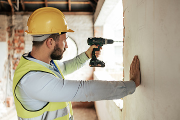 Image showing Construction worker, man or drilling wall with electric tool for utility lines, pipes or duct work in office building property. Engineering worker or architect drill on real estate construction site