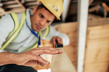 Image showing Carpenter, construction and project with wood, man and DIY with development in his home for building, renovation and builder. Carpentry, contractor and maintenance work with a young male handyman