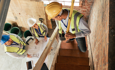 Image showing Top view, construction building and team planning with blueprint, collaboration and conversation. Architecture, engineer and teamwork on site brainstorming, discussion and group project with hardhat.