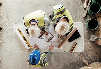 Image showing Architect, engineer and teamwork with blueprint from above on a building or contractor project. Building, construction team and architecture design sketch with people planning a renovation project