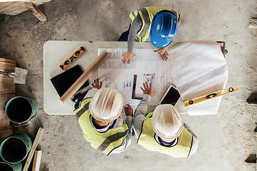 Image showing Architect, construction and blueprint with an engineer and designer team working on a building site from above. Meeting, planning and architecture with a design group in collaboration on a project