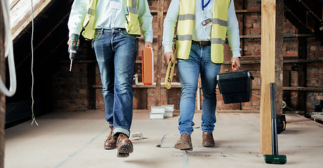 Image showing Walking, construction and teamwork with an engineer and designer working on a building site. Industry, developer and collaboration with a construction worker and engineering professional at work
