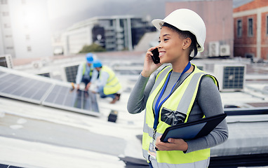 Image showing Solar energy, solar panels and electrician on a phone call networking, talking or speaking to a technician. Engineering, roof and happy woman in conversation or communication about renewable energy
