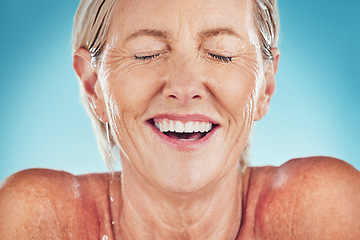 Image showing Water, face and mature woman washing or cleansing her skin for hygiene and grooming. Older woman, splash and beauty clean for facial hydration and wellness or skincare or skin care