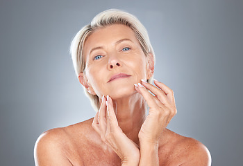 Image showing Senior woman, skincare and beauty of a model holding her healthy face ready for wellness and skin treatment. Portrait of a elderly person from Finland touching smooth body texture after dermatology