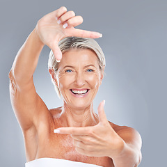 Image showing Picture hand face frame, happy and senior woman with a smile from skin wellness and beauty. Portrait of a elderly person model feeling happiness from skincare and anti aging cosmetic treatment