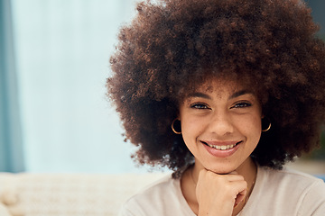 Image showing Happy, smile and woman with afro in the living room to relax, zen and peace with mockup on the sofa. Happiness, calm and young African girl with empowerment, confidence and mock up space in a house