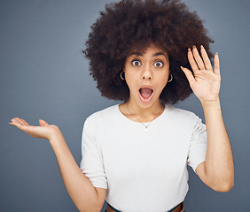 Image showing Wow, marketing and face of a woman with hand for advertising, sale and announcement against a grey mockup studio background. Retail, service and portrait of a girl with surprise for a deal with space