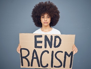 Image showing Portrait of black woman, end racism and protest banner for activism, freedom support or racial independence. African american person, protesting board and proud diversity in grey background studio