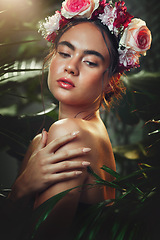 Image showing Woman, beauty and flower headband in forest for cosmetic skincare treatment. Young model, healthy natural skin glow and wellness bodycare in tropical plant rainforest outdoors with rose floral crown