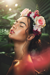 Image showing Face, beauty and flowers with a model woman in studio on a natural forest background for wellness or skincare. Nature, luxury and cosmetics with an attractive young female in a rainforest or jungle