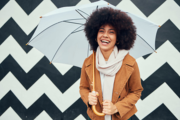 Image showing Creative, fashion and black woman with umbrella in city standing by black and white pattern wall. Beauty, happiness and girl enjoying weekend, freedom and holiday in urban town by monochrome design