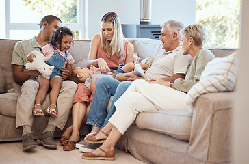 Image showing Love, children with grandparents in a big family as mother and father play with kids on the sofa or couch. Dad mom and young kids happy to enjoy bonding with lovely grandmother and senior man in home