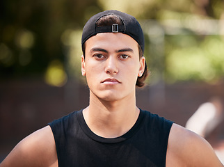 Image showing Fitness, basketball and portrait of an athlete on a court for a match, workout or training. Health, sports and face of healthy man standing ready on an outdoor field for a game, practice or exercise.