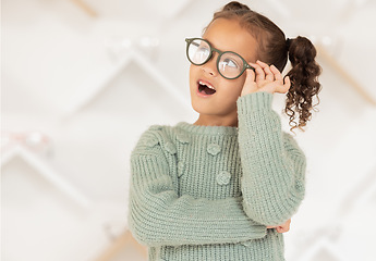 Image showing Child, girl or kid and fashion glasses, vision eye frame or medical healthcare eyes prescription in optometry clinic. Eye care lens, insurance or optician eyeglasses for youth with wow or amazed face