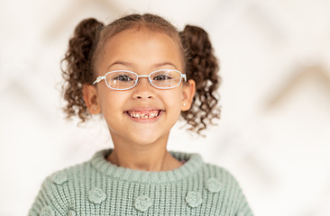 Image showing Glasses, vision and children with a girl customer in an optometry office for new frame eyewear. Portrait, retail and eyesight with a young female child at the optician for prescription lenses