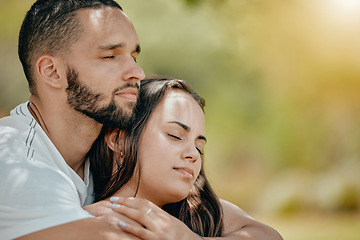 Image showing Nature, love and young couple rest in park enjoying weekend, freedom and holiday together. Romance, bonding and man and woman hugging, embracing and holding each other with closed eyes outdoors