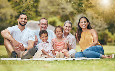 Image showing Family, picnic and smile of a mother, dad and kids with grandparents in a nature park. Portrait of children, mom and dad loving summer together with a smile and quality time bonding outdoor with love