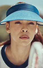 Image showing Woman, tennis and racket with motivation, focus and training to play game on court. Serious, focused athlete outdoor playing competitive sport match for fitness, workout and healthy in sports club