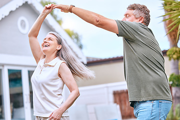 Image showing Senior couple, dancing and happy retirement in summer backyard garden for romance, quality time or relax together. Elderly man, smile woman and dance for anniversary, love and joy celebration outdoor