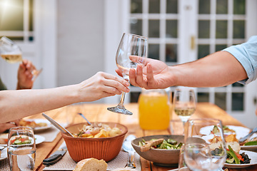 Image showing Wine glass, food and outdoor lunch of a man and woman hand ready for wine and eating. People couple hands help at the table for thanksgiving with alcohol drink and friends on a home patio in summer