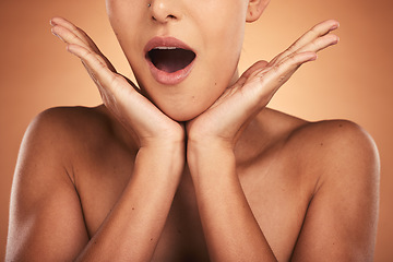 Image showing Surprise, woman and hands for skincare, natural beauty, and excited on brown studio background for cosmetics or bare. Wow, makeup or young female with shocked expression, organic facial or mouth open