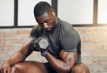 Image showing Fitness, body builder and black man with dumbbell training, workout or challenge exercise with muscle power, energy and music. Strong, audio and sports person listening for bodybuilder motivation