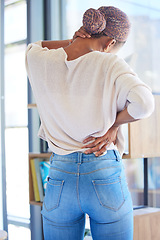 Image showing Black woman, back and neck pain in stress, tired or overworked from working at home. African American female suffering from muscle tension, discomfort or ache in burnout or mental health issues