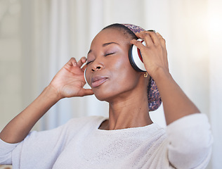 Image showing Music, headphones and black woman listening to radio sound, wellness audio podcast or gospel soundtrack. Stress relief, relax and African girl streaming song for peace, freedom and healthy mindset