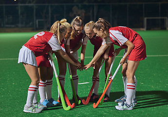 Image showing Hockey, together hands and women teamwork, support or motivation for game, competition or training strategy communication. Leadership, sports and group hand stack circle in target goal collaboration