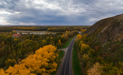Image showing Aerial view of road in beautiful autumn Altai forest