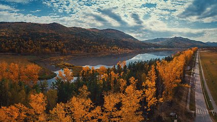 Image showing Aerial view of road in beautiful autumn Altai forest