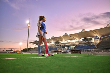 Image showing Hockey, stadium and woman sports training, thinking of game strategy and goal fitness health on green pitch field with sunset sky. Young teenager or athlete girl with training gear for competition