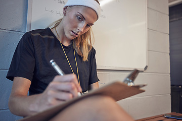 Image showing Woman, sport coach and clipboard writing of an athlete writing exercise schedule or plan. Personal trainer or gym fitness instructor planning a sports class, wellness balance and team class data
