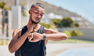 Image showing Fitness, runner or black man checking pulse on smartwatch for training time, wellness goal or workout on tracker app. Athlete, jogger or man for watch progress, heart rate or health cardio in street