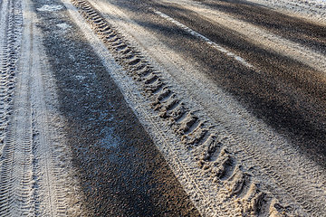 Image showing narrow winter road , closeup