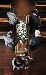 Image showing Funeral, coffin and family mourning death of loved one, death and carrying wood casket in church for faith wake, eulogy and memorial. Pallbearers, spiritual grief and sad friends burial flower wreath