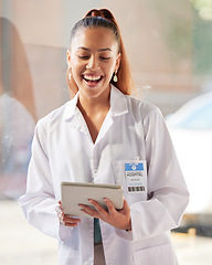 Image showing Doctor, health and hospital, woman with tablet for digital medical information, technology and medicine. Happy for healthcare, professional and clinic staff with tech for innovation and research.