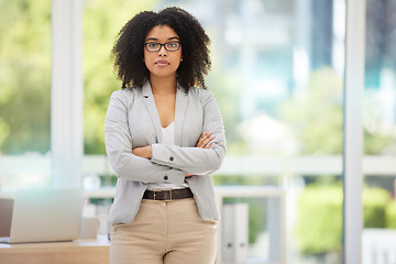 Image showing Portrait, black woman and leader with arms crossed, pride for startup company or confident in office. Leadership, female entrepreneur or manager for marketing brand, advertising business or empowered