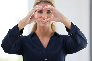 Image showing Portrait of office worker, hands in heart shape and employee satisfaction in the workplace, happy staff and company solidarity. Professional business woman, love symbol and corporate work commitment