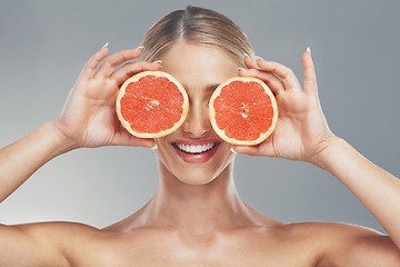 Image showing Woman, beauty and product with grapefruit skincare for healthy skin, self care and natural cosmetics glow. Facial citrus moisturizer, happy face and moisturizing vitamin c organic cosmetology routine